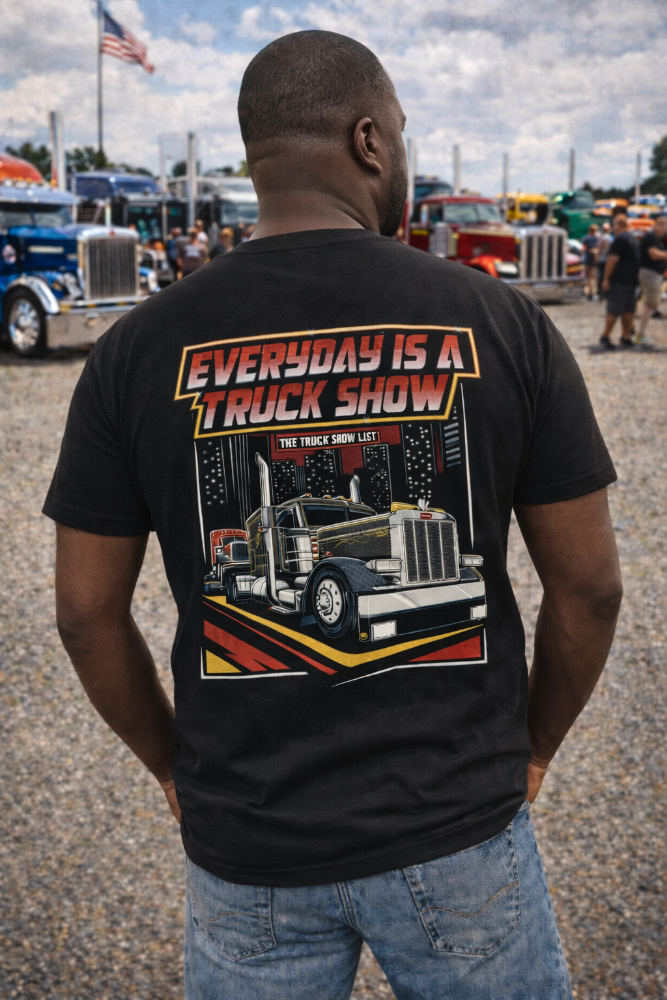 Person wearing a black t-shirt with Every Day is a Truck Show at a truck show.